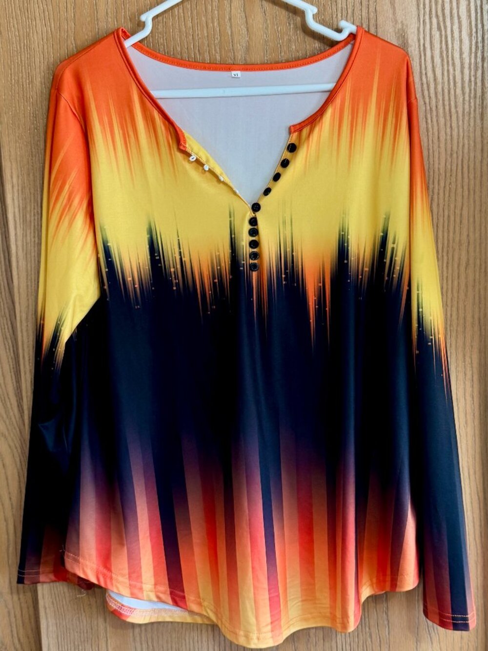 Henley-type Tunic Womens blouse. Distinct flame-like orange, yellow, & black XL